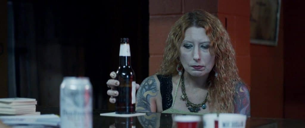 Redhead with a beer